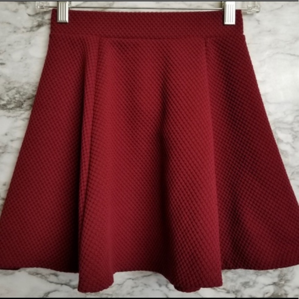 A red skirt textured with dots